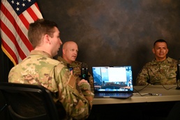 97 AMW command team ‘Debriefs’ with new podcast