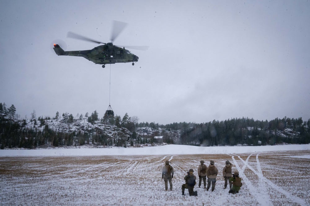 U.S. Marines with Combat Logistics Battalion 6 Conduct a Helicopter Lift with Finnish NH90 Aircraft