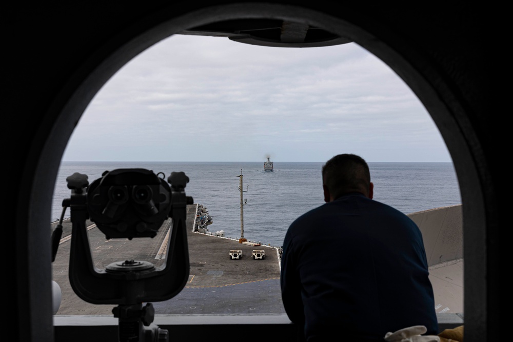 Abraham Lincoln sailor observes the USS Kaiser