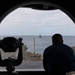 Abraham Lincoln sailor observes the USS Kaiser