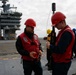 Abraham Lincoln conducts a fueling-at-sea with Henry J. Kaiser