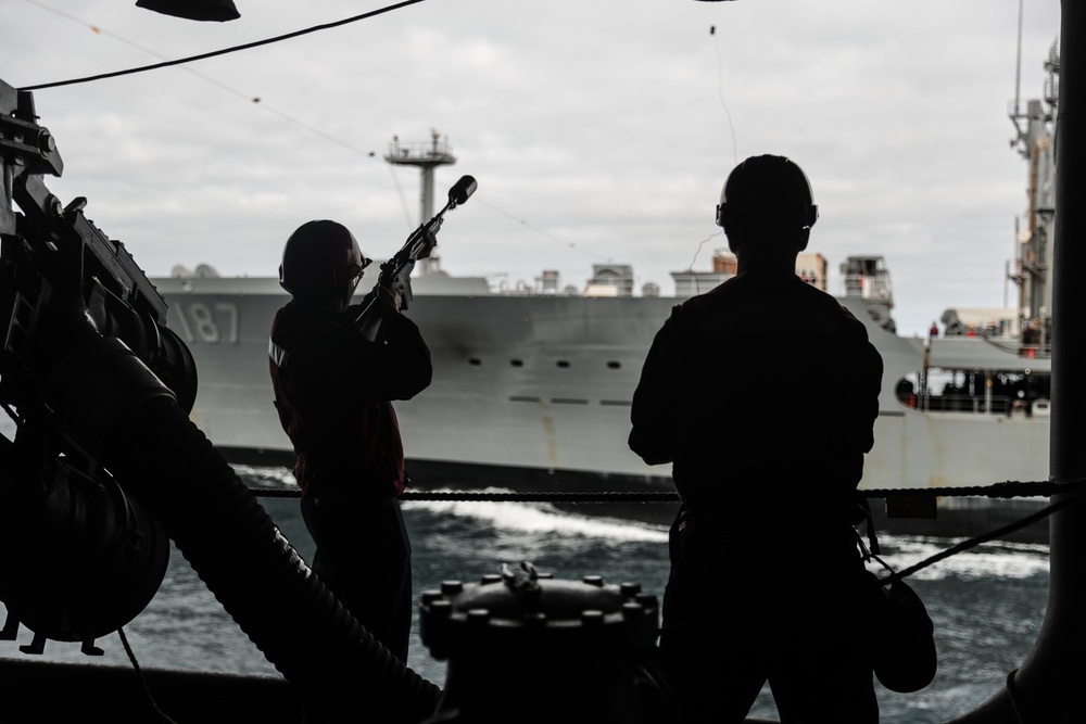 Abraham Lincoln conducts a fueling-at-sea with Henry J. Kaiser