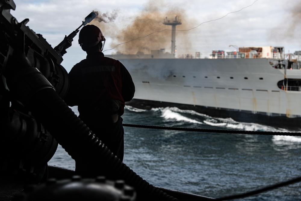 Abraham Lincoln conducts a fueling-at-sea with Henry J. Kaiser