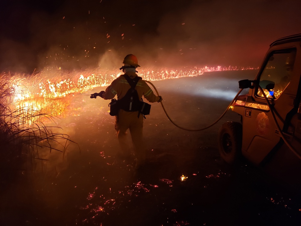 DVIDS - News - Base Firefighters Aid Emerado, Extinguish 400-acre ...