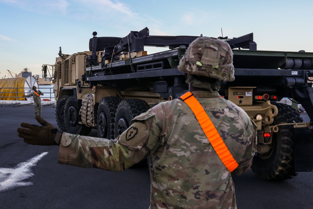 Military vehicles download as part of the APS-3 from the U.S. Naval Ship Watson.