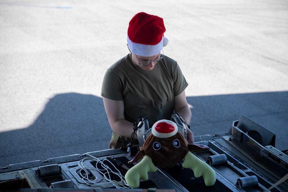 Yokota Airmen conduct a practice airdrop mission during Operation Christmas Drop 2022