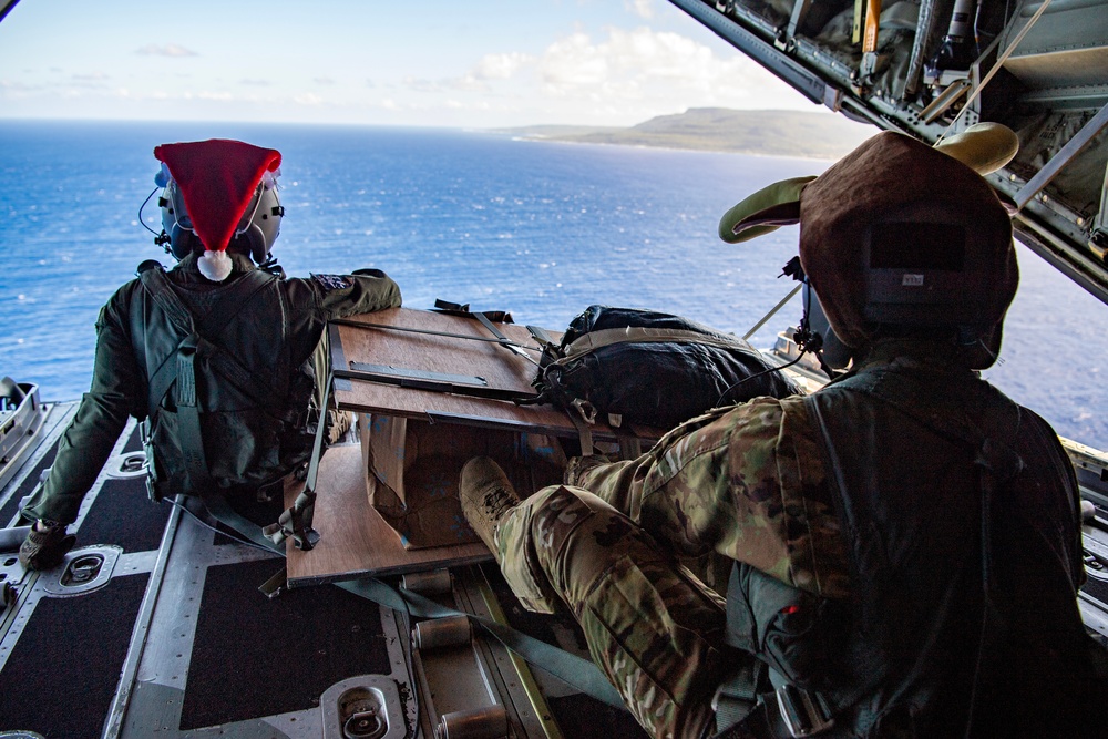 Yokota Airmen conduct a practice airdrop mission during Operation Christmas Drop 2022