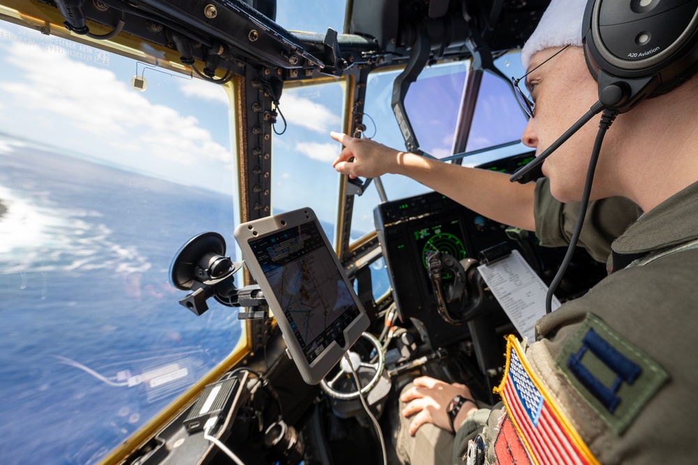 Yokota Airmen conduct a practice airdrop mission during Operation Christmas Drop 2022