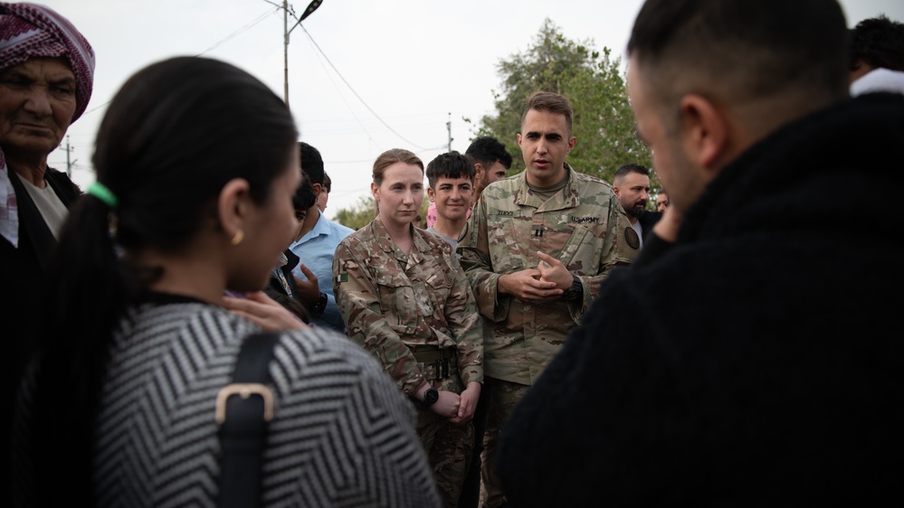 MAGN, CJTF-OIR personnel visits displaced persons to study the atmospherics of residents