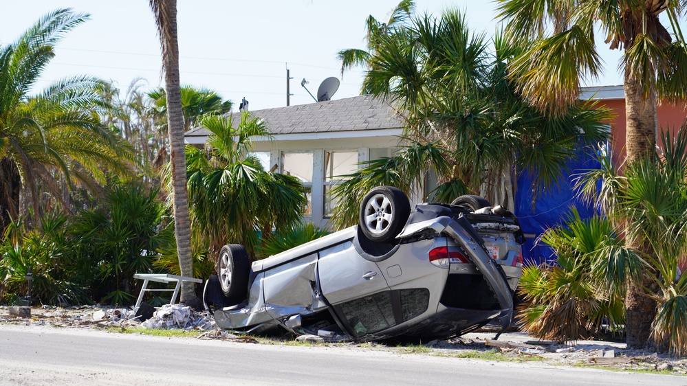 Car damage in areas impacted by Hurricane Ian