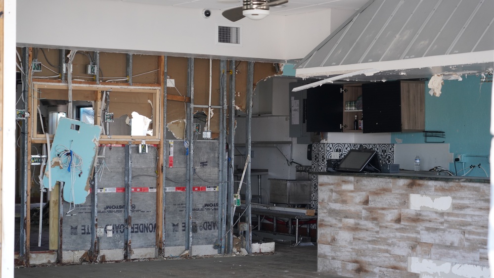 Look from inside a flooded restaurant in Fort Myers