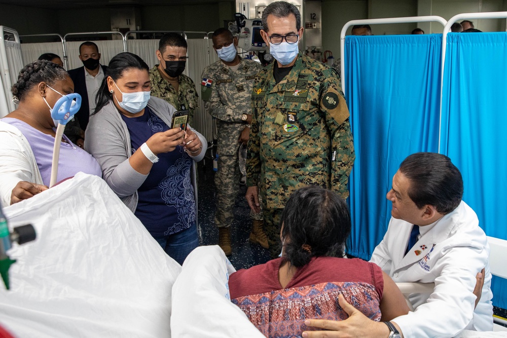 Lt. Gen. Carlos Diaz-Morfa, Dominican Republic Minister of Defense, and Dr. Daniel Rivera, Dominican Republic Minister of Health, take a tour of USNS Comfort during Continuing Promise 2022, in Santo Domingo