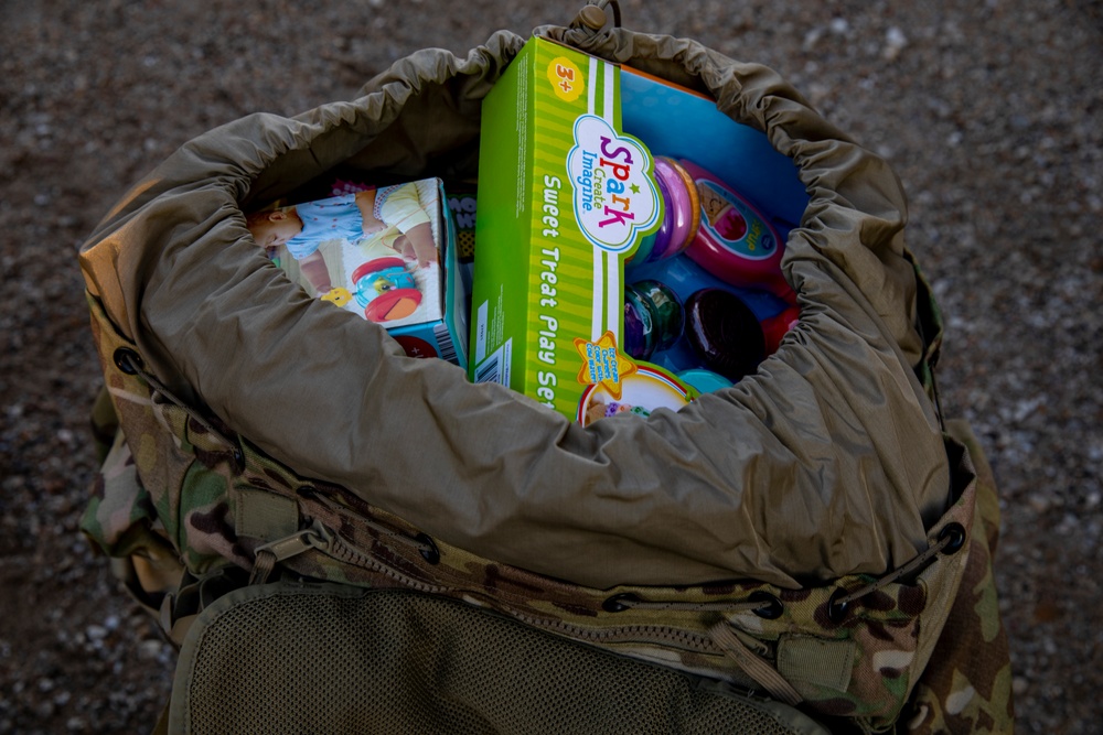From Backpacks To Present Sacks: F/1 AVN Soldiers hosts Toys For Tots Foot March In Manhattan