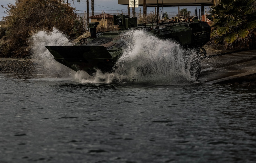 U.S. Marines execute ACV troop transfer and towing drills