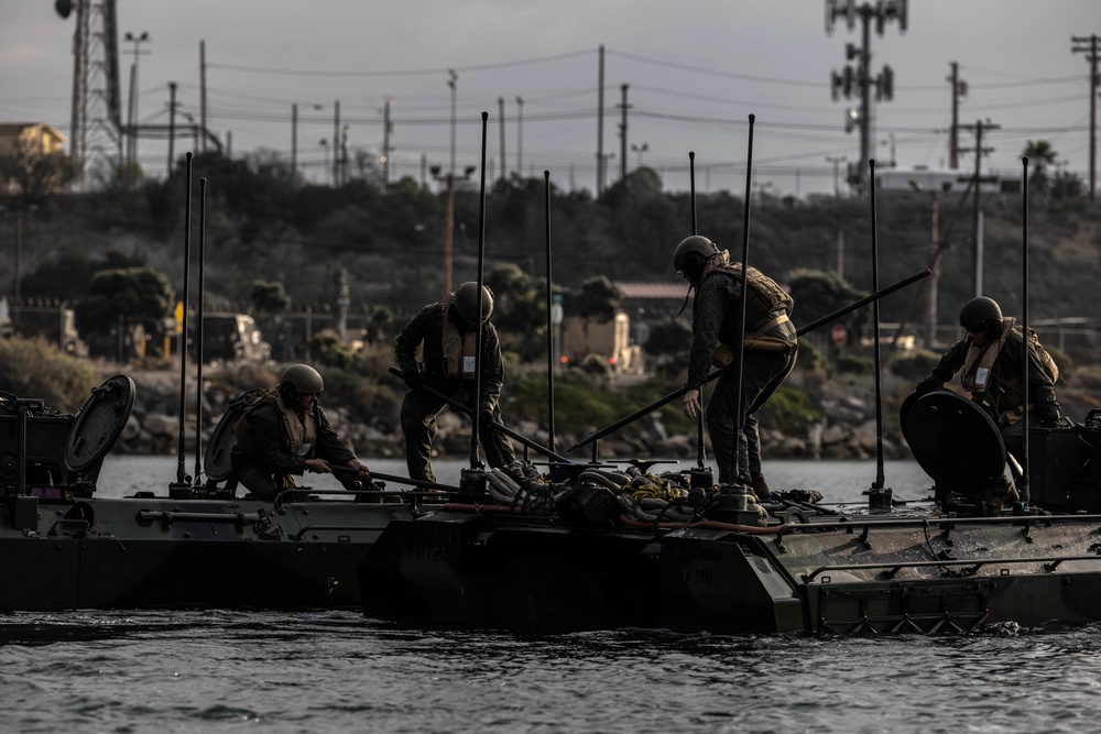 U.S. Marines execute ACV troop transfer and towing drills