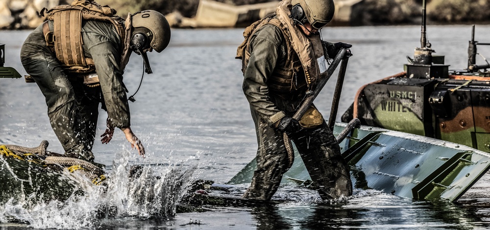 U.S. Marines execute ACV troop transfer and towing drills