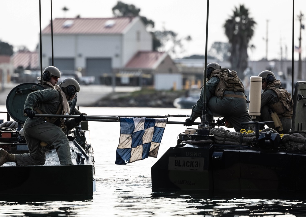 U.S. Marines execute ACV troop transfer and towing drills