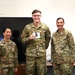 Cadet Lyzenga poses for a picture with SBD 3 commander after receiving his USSF patch