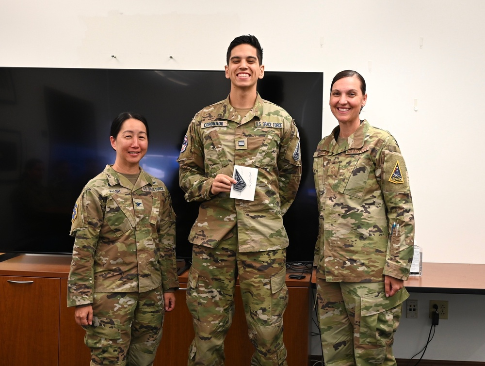 Cadet Coronado poses for a picture with SBD 3 commander after receiving his USSF patch