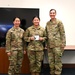 Cadet Reyes poses for a photo with SBD 3 commander after receiving her USSF patch