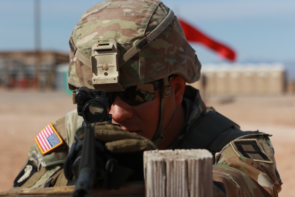 5th Armored Brigade Soldier adjusts sight on target