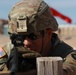 5th Armored Brigade Soldier adjusts sight on target