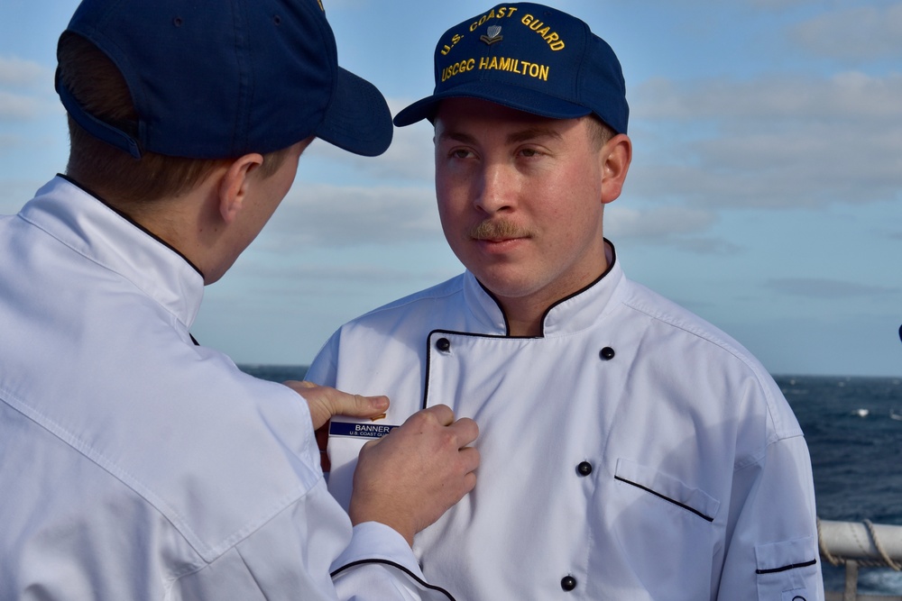 USCGC Hamilton crew members hold advancement ceremony at sea