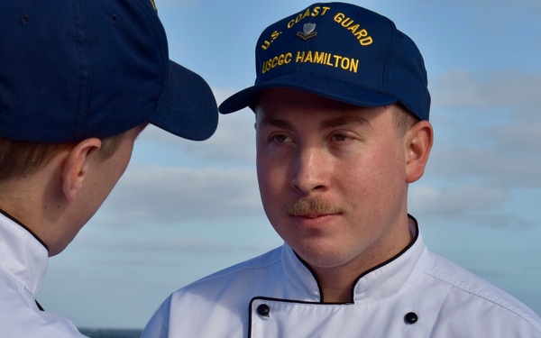 USCGC Hamilton crew members hold advancement ceremony at sea