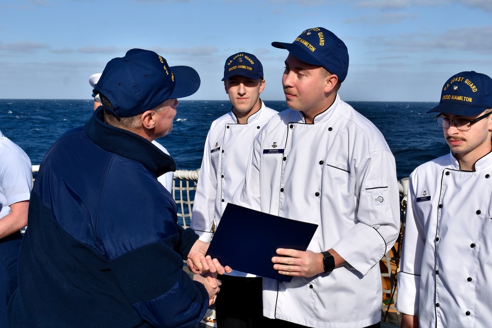 USCGC Hamilton crew members hold advancement ceremony at sea