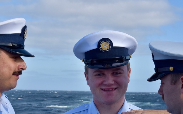 USCGC Hamilton crew members hold advancement ceremony at sea