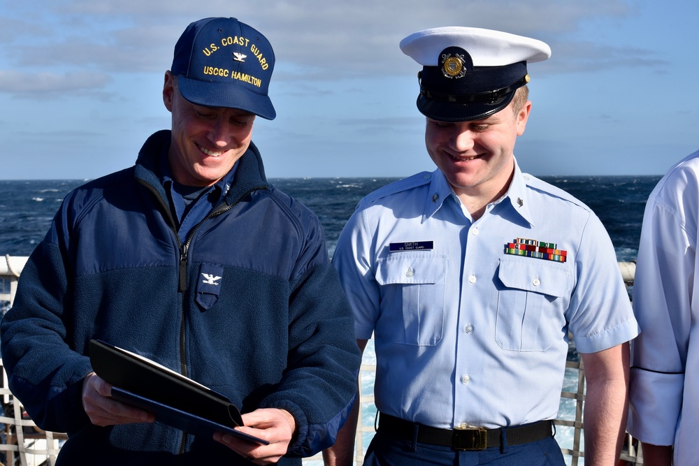 USCGC Hamilton crew members hold advancement ceremony at sea