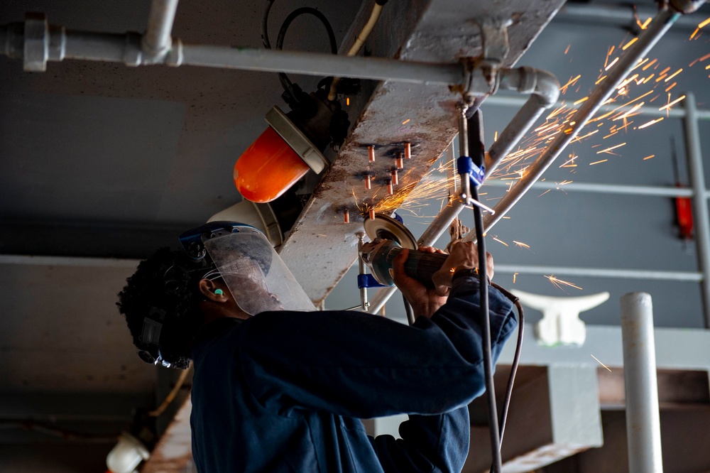 USS Carl Vinson (CVN 70) Sailors Work In-Port
