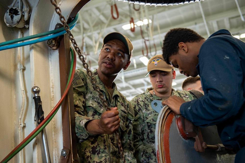 USS Carl Vinson (CVN 70) Sailors Work In-Port