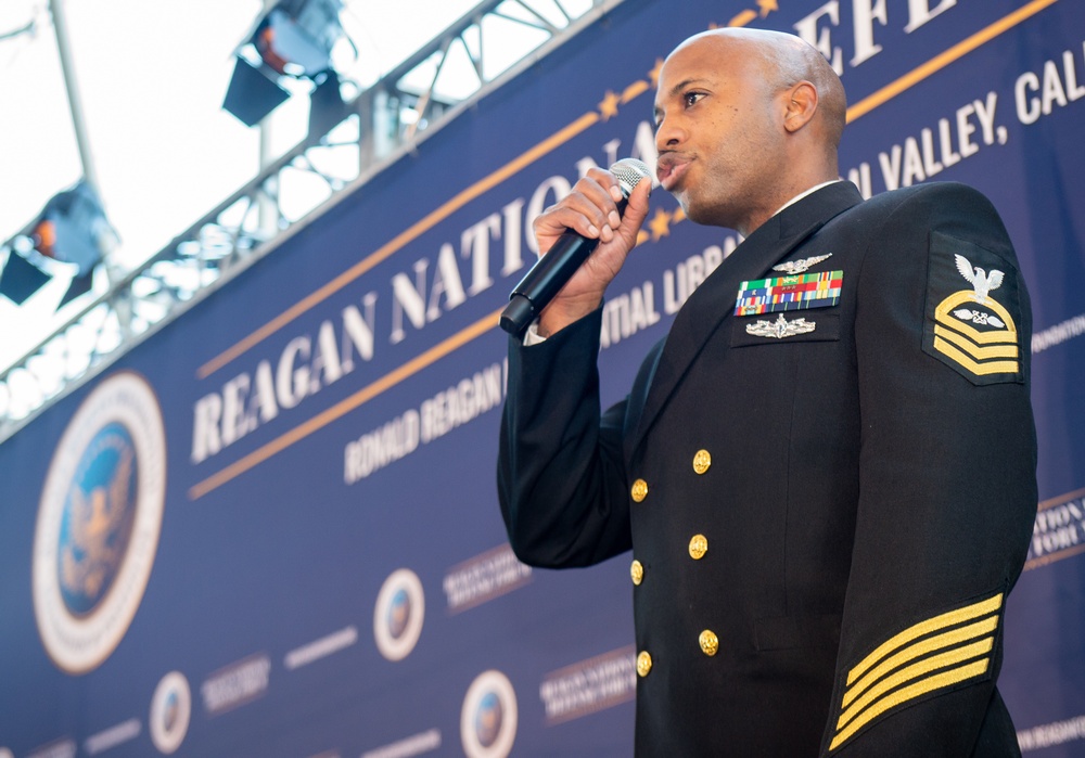 USS Ronald Reagan (CVN 76) Sailor Sings National Anthem at Reagan National Defense Forum