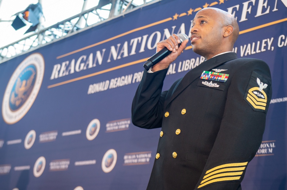 USS Ronald Reagan (CVN 76) Sailor Sings National Anthem at Reagan National Defense Forum