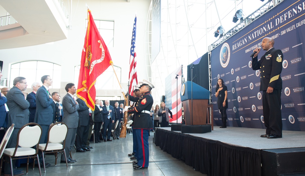 USS Ronald Reagan (CVN 76) Sailor Sings National Anthem at Reagan National Defense Forum