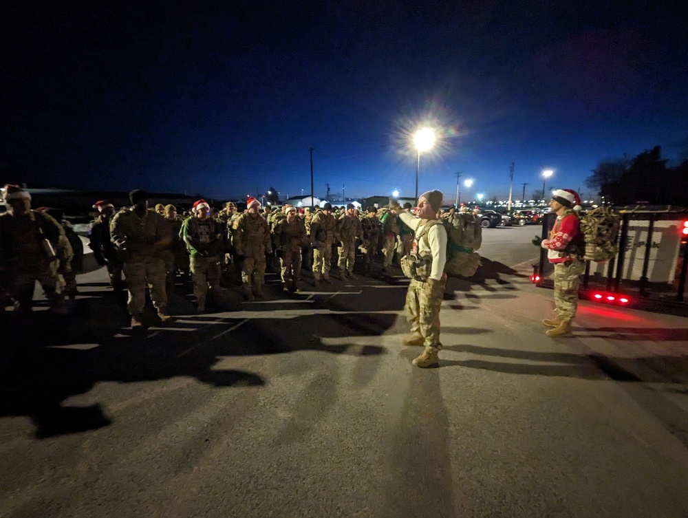 Fort Drum NCOs march on a mission to deliver a “Mountain of Toys”