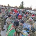 Fort Drum NCOs march on a mission to deliver a “Mountain of Toys”