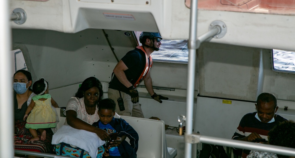 CIVILIAN MARINERS ABOARD USNS COMFORT TRANSPORT PATIENTS, DOMINICAN REPUBLIC