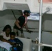 CIVILIAN MARINERS ABOARD USNS COMFORT TRANSPORT PATIENTS, DOMINICAN REPUBLIC