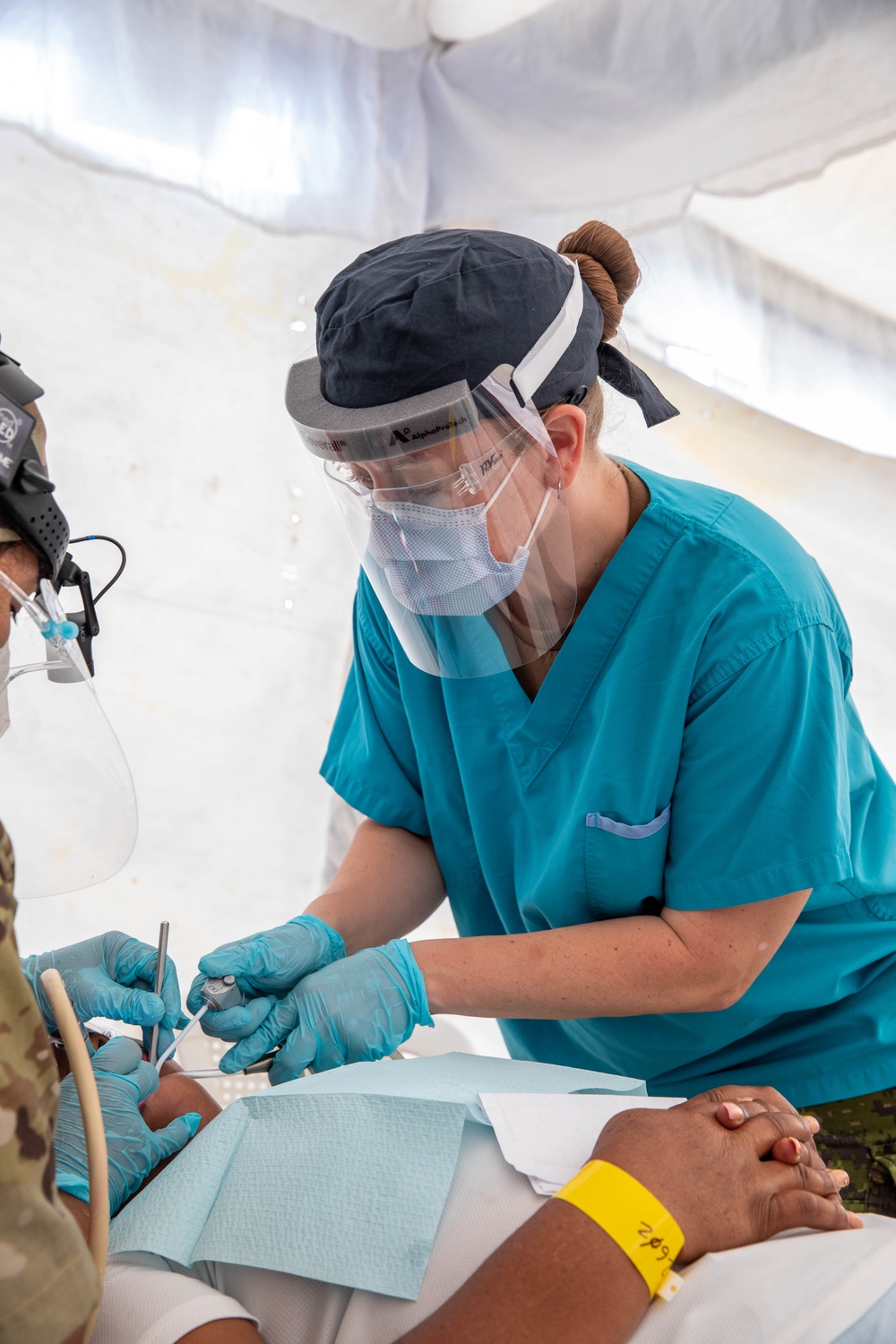 Canadian Armed Forces assigned to the USNS Comfort perform medical and dental care at medical site in Azua, Dominican Republic during Continuing Promise 2022