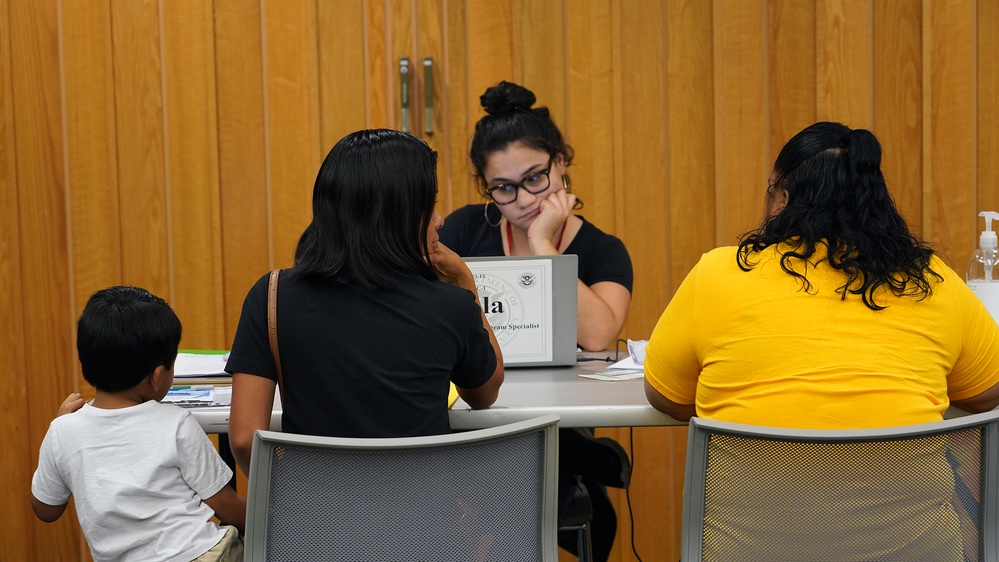 FEMA Employees Register Survivors for Assistance at a Local Disaster Recovery Center