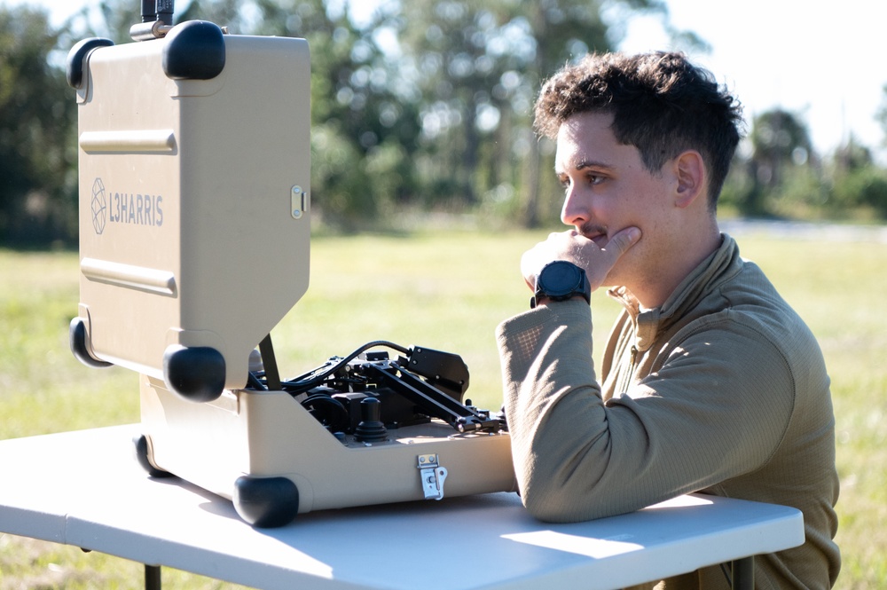 Commander visits EOD for demonstration