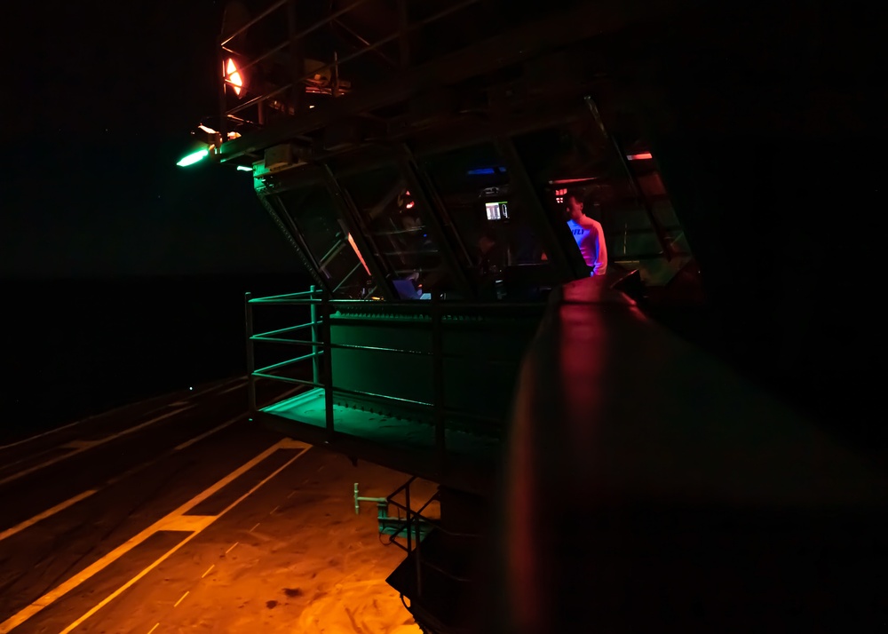 Sailors Observe Flight Deck Operations