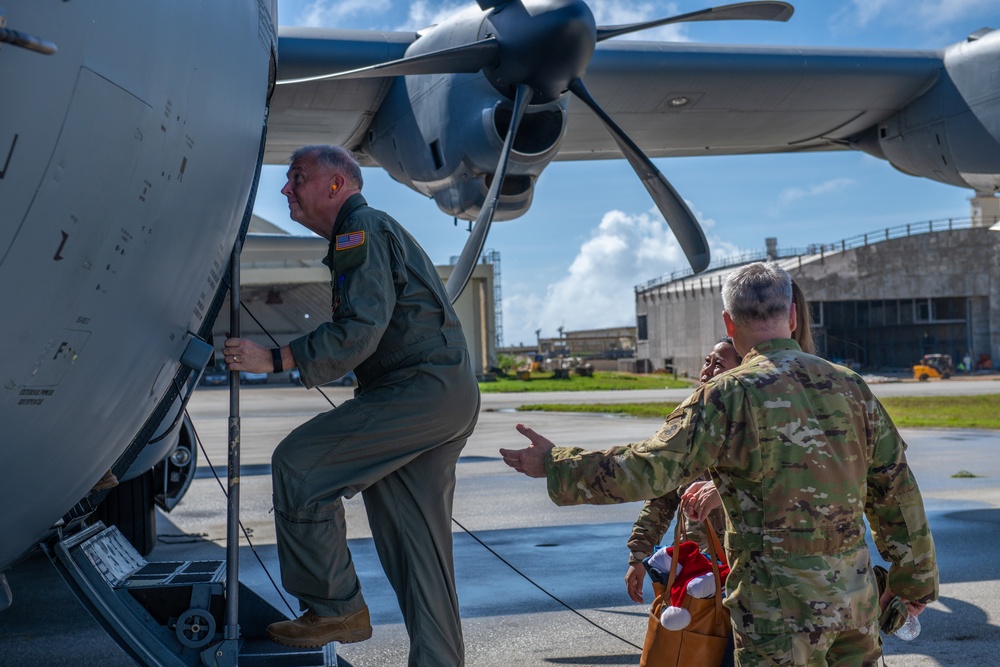 5th Air Force, United States Forces Japan, Alaskan Air Force and 11th Air Force command team drop bundles during Operation Christmas Drop 2022