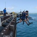 Navy Divers Conduct ATFP Security Swim During USS West Virginia Port Visit at NSF Diego Garcia