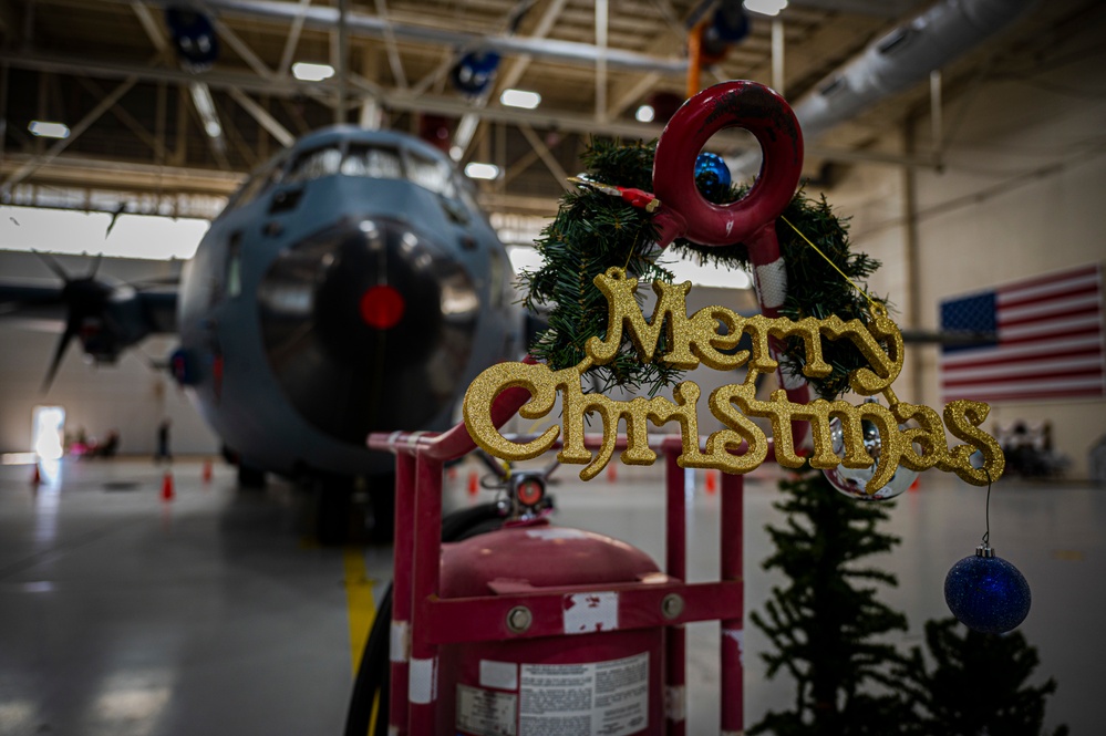 317th AW hosts Santa-in-a-Herk holiday event