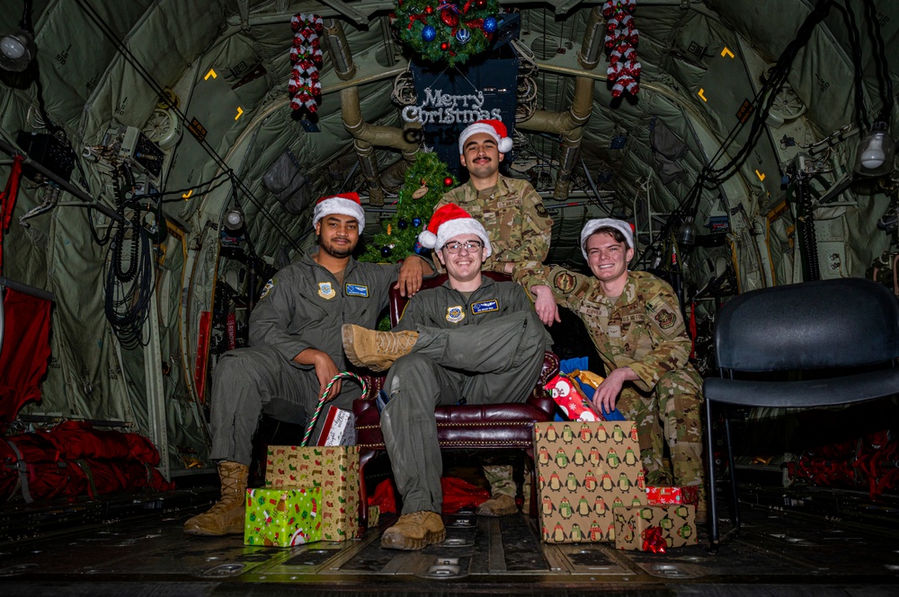 317th AW hosts Santa-in-a-Herk holiday event