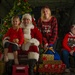 317th AW hosts Santa-in-a-Herk holiday event