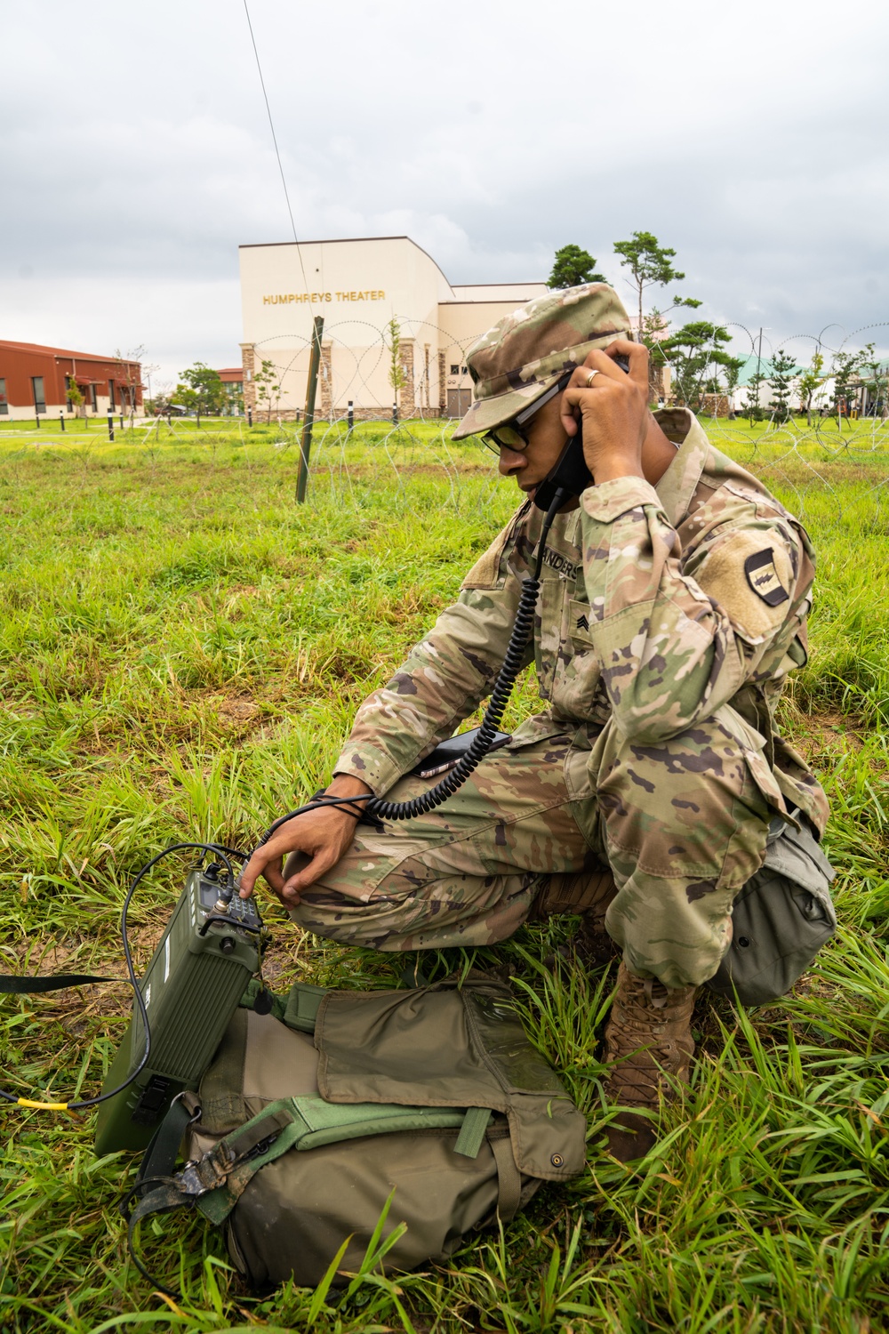 Soldiers conduct signal operations in a field environment